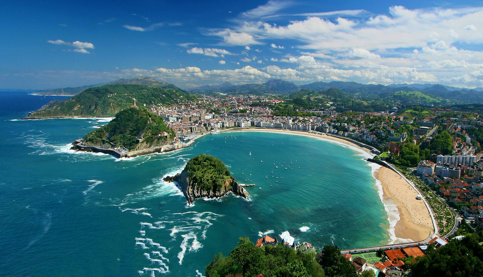 La Concha bay and beach in San Sebastián seen from above, with Santa Clara island in the middle