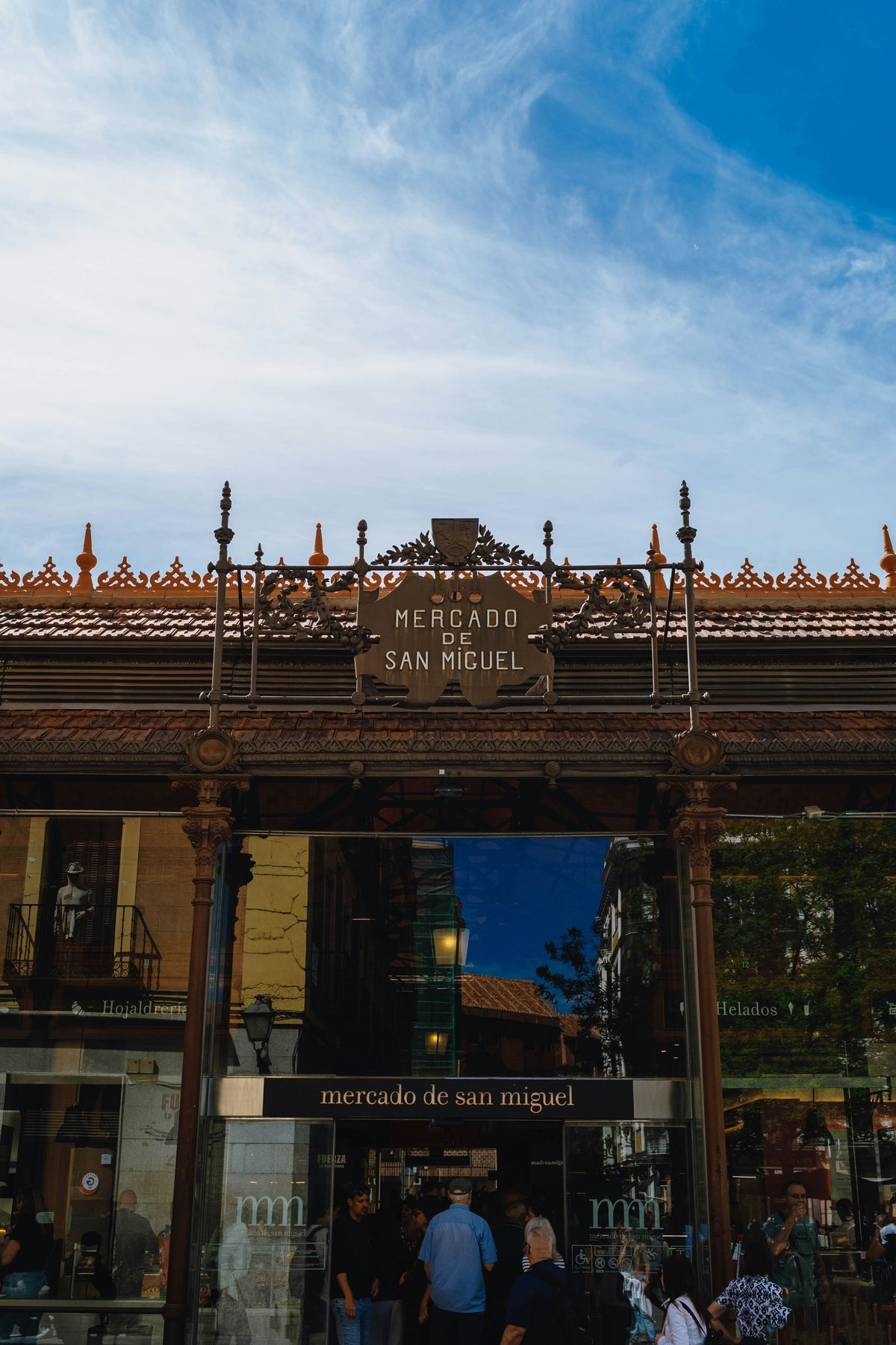 Ornate ironwork entrance of Mercado de San Miguel in Madrid