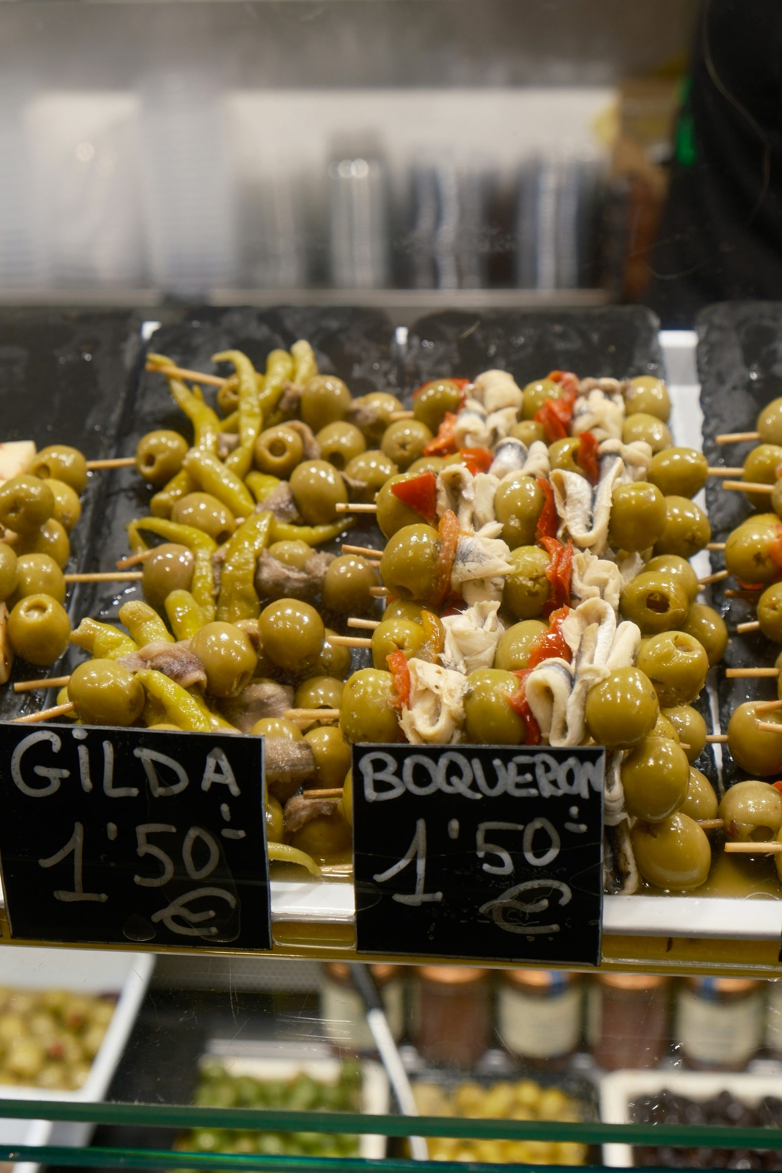 Pan amb tomàquet and Spanish shrimp tapas served on a wooden board