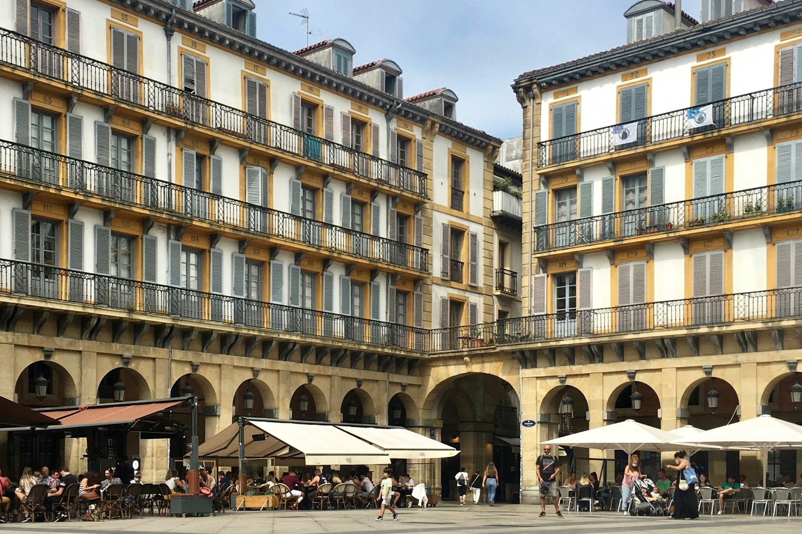 Arcades and numbered balconies around Plaza de la Constitución in San Sebastián